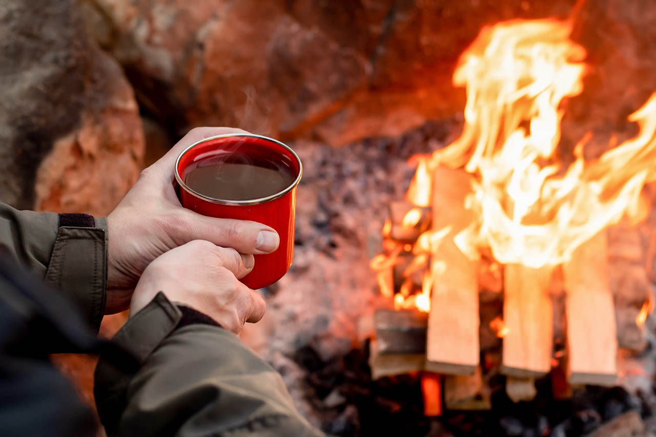 Enjoy a cup of spiced cider while sitting around the campfire at Beaver Meadow Family Campground near Buffalo NY